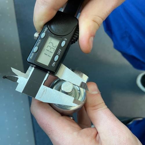 Caliper checking a castor retaining feature