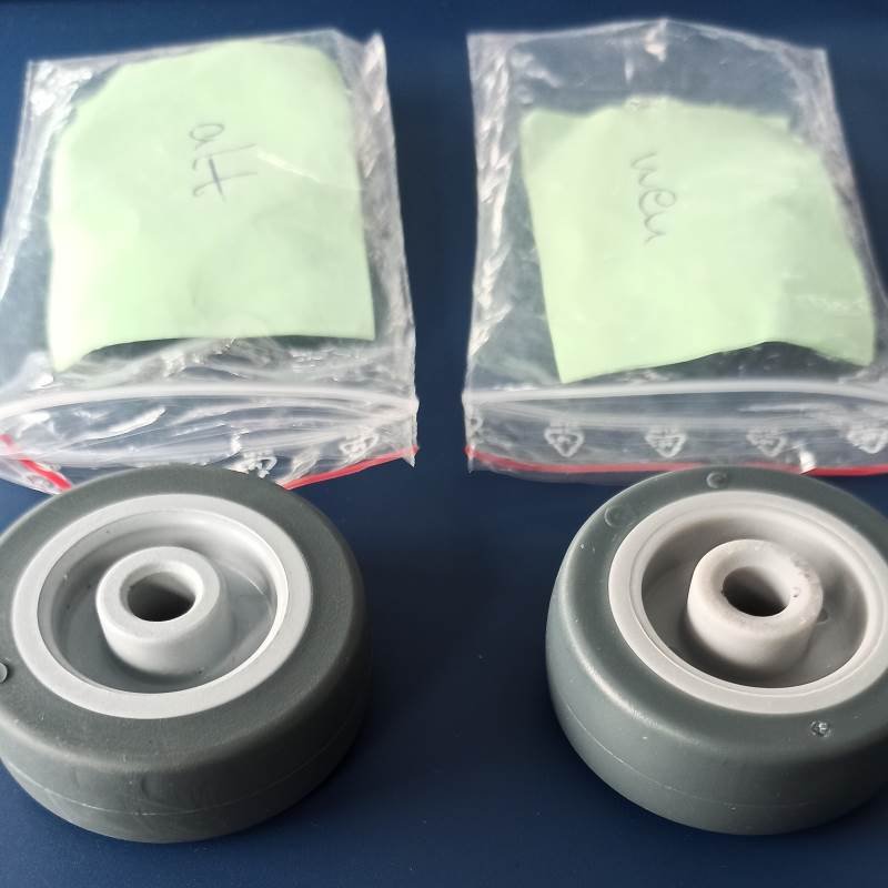 Two plain bearing TPR wheel samples shown side by side for hub comparison