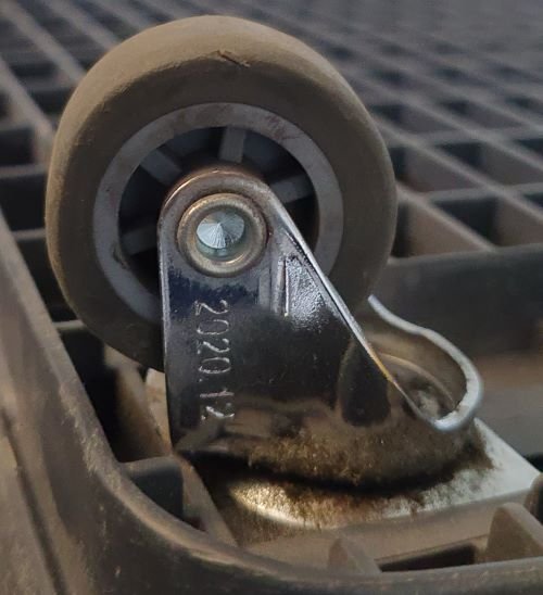 Close view of a swivel castor for shopping basket trolleys