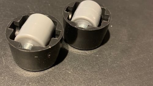 Two small inset castors - TPR and PP Castor